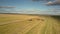 Aerial round view harvesters and truck stand near gray car