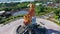 Aerial roundabout with fish statue with barong head in Pelabuhan Benoa harbor in Bali