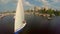 Aerial of sailboat leaving dock. Summer vacation, active rest