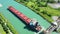 Aerial scene of a Lake Freighter travelling in the Welland Canal, Canada 4K