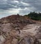 aerial scene of the land erosion due to deforestation and earth mining.