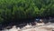 aerial scene of the wooden village at the forest mangrove landscape.