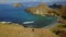 Aerial scenery of woman walking on Padar Island hill