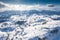 Aerial scenic rural view of the winter landscape from Fundata village in Romania at the bottom of Bucegi Mountains