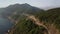 Aerial scenic view of amazing coastal cliffside road, mountain landscape.