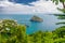 Aerial scenic view on Aragonese castle through foliage, Ischia, Italy