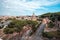 Aerial scenic view of Colosseum, Roman Forum in Rome and church