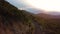 Aerial scenic view at sunset on a road in the mountainous area of Asia.