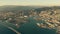 Aerial of seaport and cityscape of Genoa in the evening. Italy