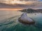 Aerial. Seascape breakwater at sunset. Port marina.