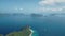 Aerial seascape at tropical islands ocean coast. Mountainous islets with tropic forest at blue water
