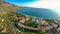 Aerial seaside view over seaside city of Kalamata, Greece at sunset