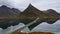 Aerial Serenity in Lofoten: Drone Captures Car Crossing a Bridge on a Sunny Autumn Day in North Norway