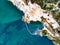 Aerial shoot of a lake coast with sand mining