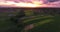 Aerial shoot over rice terrace with buildings