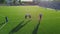 Aerial shooting with a drone as players play football on the field