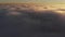 Aerial shot above thick clouds upper surface against horizon