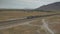 Aerial shot of amtrak train and desert town