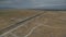 Aerial shot of Amtrak train and desert town