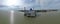 Aerial shot of the Bagan Datuk Jetty in Perak, Malaysia against a clouded sky