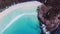 Aerial shot of a beautiful beach zooming out