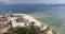 Aerial shot of beautiful blue water sea in Bali, Indonesia. Paradise Island in south east Asia. Swimming people, small