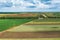 Aerial shot of beautiful countryside landscape with cultivated fields in Banat, geographical region of Vojvodina province in