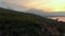 Aerial shot of the beautiful Jemeluk bay in the Amed area with the view on a marvelous Agung volcano. Sunset in Amed