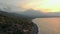 Aerial shot of the beautiful Jemeluk bay in the Amed area with the view on a marvelous Agung volcano. Sunset in Amed