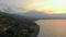 Aerial shot of the beautiful Jemeluk bay in the Amed area with the view on a marvelous Agung volcano. Sunset in Amed