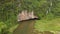 Aerial shot of beautiful limestone mountains with passes carved by a river in Ninh Binh region, a famous tourist