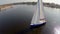 Aerial shot of beautiful sailing yacht on river, yachting, sport