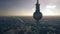 Aerial shot of Berlin cityscape behind the silhouette of the television tower, Germany