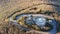 Aerial shot of a building located on a top of the Brasstown bald mountain  during the day