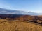 Aerial shot of the Bukk Mountains in winter, dense hilly landscape, Bukk National Park at sunrise