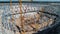 Aerial shot of Cable-stayed roof structures of a football stadium