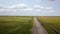 Aerial shot of car on the rural road