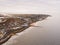 Aerial shot of the city  seashore on a gloomy day