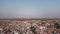 Aerial Shot of The City Of Taj , Agra , Uttar Pradesh, India , Drone Approaching Taj Mahal Through Densely Populated Old