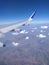 Aerial shot.of clouds and aeroplane wing from window nature