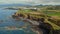 Aerial shot, drone point of view picturesque landscape, volcanic rocky mountains and Atlantic Ocean View at sunny summer day. San