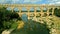 Aerial shot of famous Pont du Gard, the Roman aqueduct bridge of Nimes over the Gardon River. France