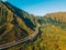 Aerial shot of famous stairs through the Oahu green mountains in Kaneohe, Hawaii