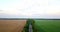 Aerial shot of fields with various types of agriculture. Farming. Aerial shot of farmland. Aerial shot of agricultural