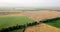 Aerial shot of fields with various types of agriculture. Farming. Aerial shot of farmland. Aerial shot of agricultural