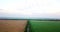 Aerial shot of fields with various types of agriculture. Farming. Aerial shot of farmland. Aerial shot of agricultural