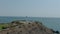 Aerial shot of the flag of France above the sea