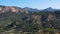 Aerial shot flying over cliffs on top of mountain in Peguera, Mallorca, Spain