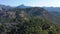 Aerial shot flying over cliffs on top of mountain in Peguera, Mallorca, Spain