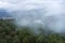 Aerial shot of the foggy forests of the Ambroz Valley, Extremadura, Spain